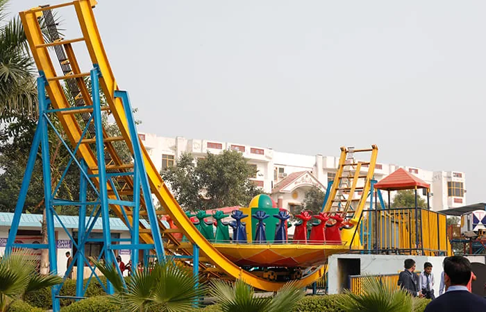Pendulum-style spinning amusement ride at Club Platinum Resort