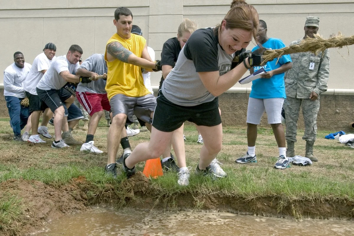 Two teams pulling a rope in a tug of war — representative photograph of a group game